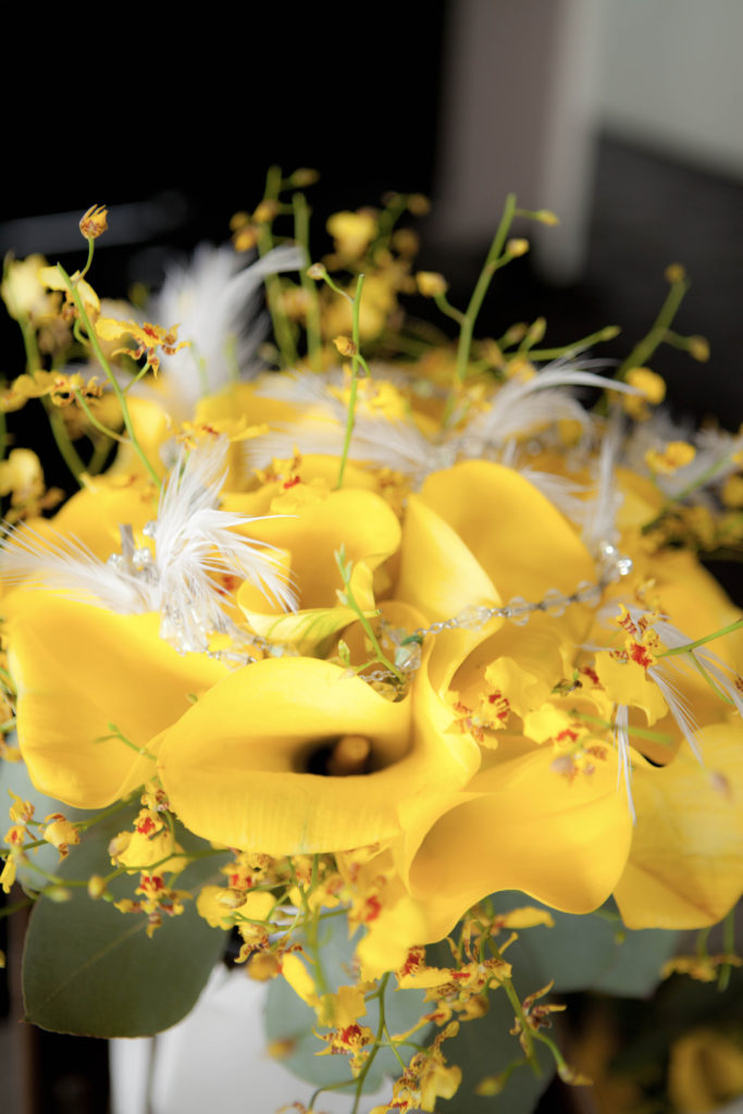 yellow bouquet with feathers