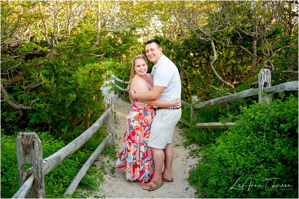 engagement photos in path at Barnegat Lighthouse 